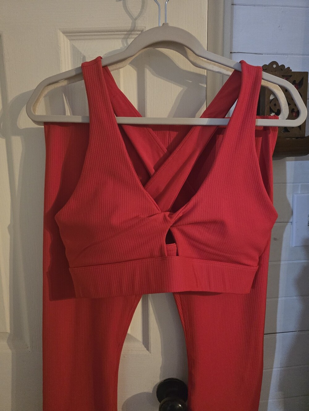 Women’s Red Ribbed Crisscross Sports Bra Top And Ribbed Leggings.
